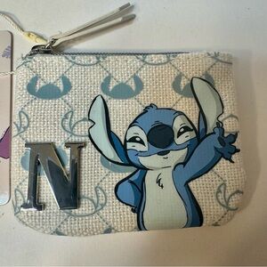 NWT. Disney Primark Stitch coin purse pouch with zipper and initial “N”